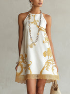 Héloïse | Vestido mini blanco de encaje con motivos dorados