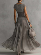 Top Grigio in Pizzo Trasparente con Pannelli e Set di Gonna Maxi Plissettata