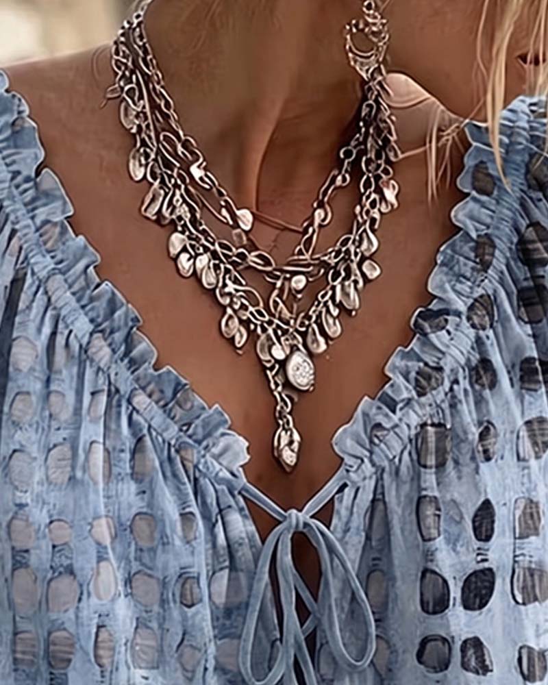 Lena | Blusa de lunares con cordón