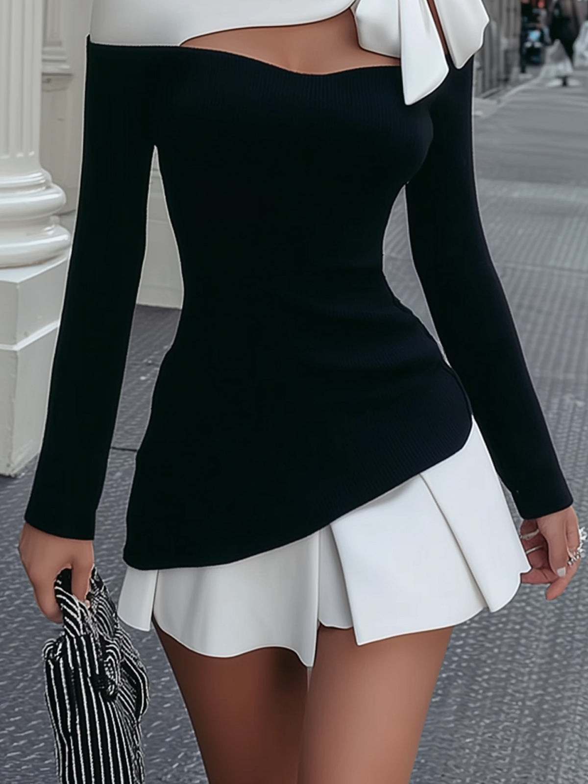 Faustine | Vestido mini blanco y negro con lazo y hombro drapeado