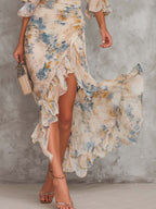 Abito Maxi in Chiffon Irregolare con Stampa Floreale e Collo Alto Beige