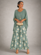 Robe longue élégante pour femme Lara™ de Danoir Paris, tissu fluide vert foncé, style sophistiqué et chic.