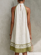 Agathe | Vestido trapecio blanco y verde oliva de flores
